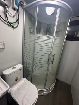 Casa de contenedor de lujo de embalaje de película plástica de Tesite de oficinas temporales de vidrio templado doble